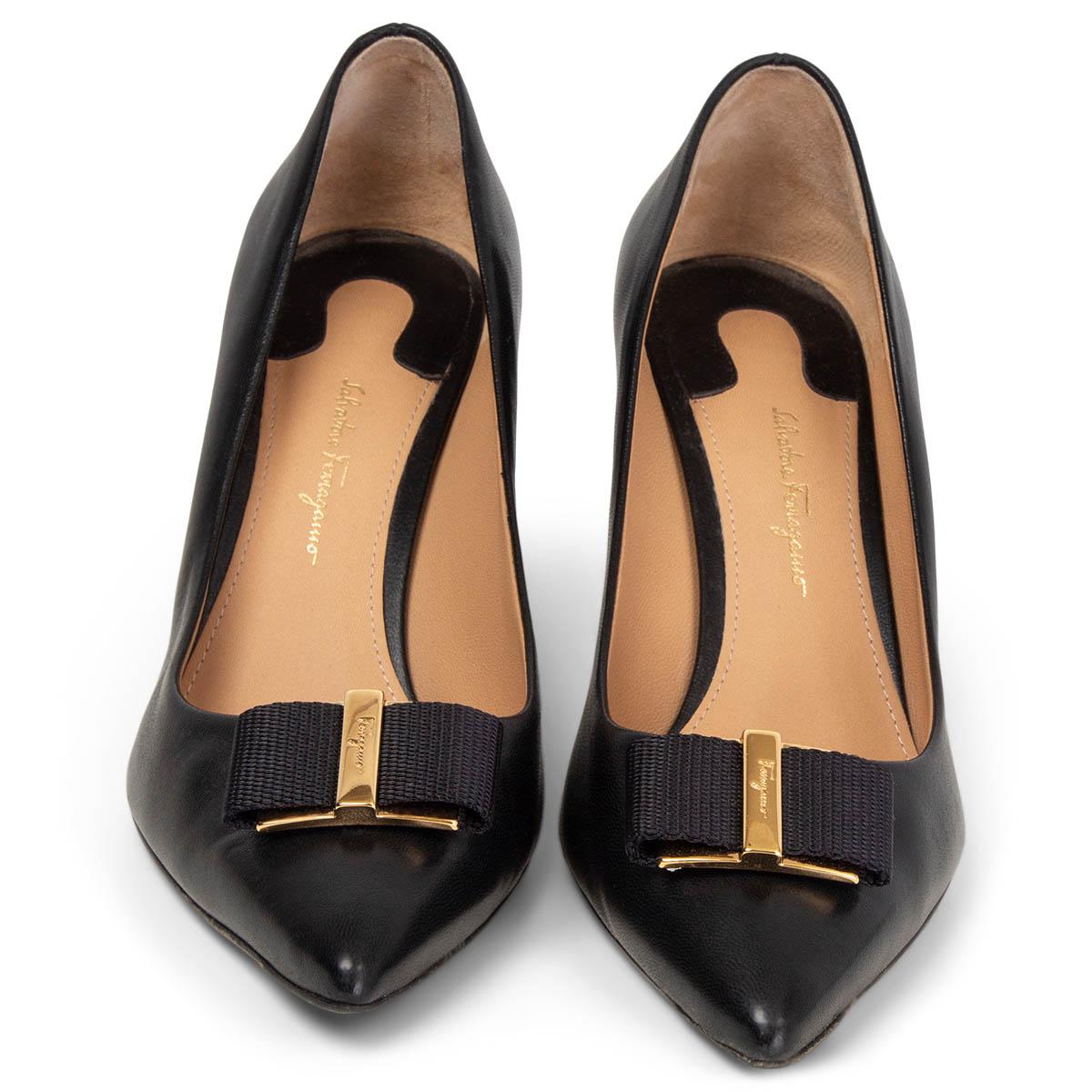 100% authentic Salvatore Ferragamo Zaia Pointed Toe Pumps in black smooth leather with a technical fabric bow detail and gold-tone hardware. Have been worn and are in excellent condition. Come with dust bag. 

Measurements
Imprinted Size	38.5
Shoe