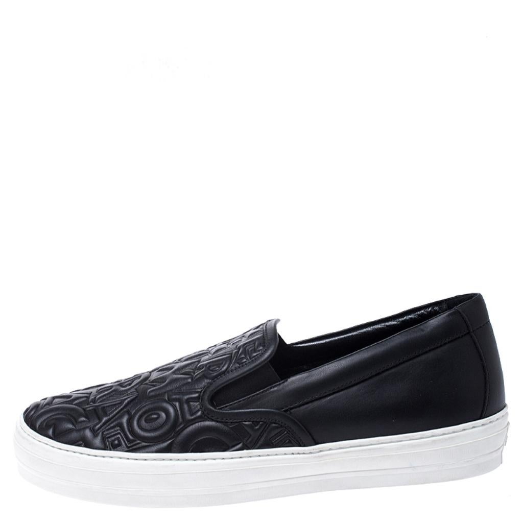 A pair of black sneakers is a must-have any season. Made from black logo-embossed leather, these sneakers come with thick white rubber soles to provide comfort and grip. The sneakers are easy to slip on and off. Pull off the street-chic look with