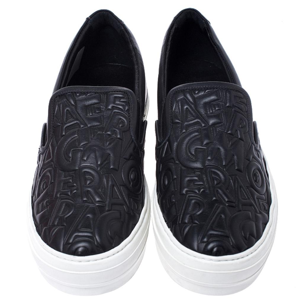 Salvatore Ferragamo Black Logo Embossed Leather Slip On Sneakers Size 40.5 In New Condition In Dubai, Al Qouz 2