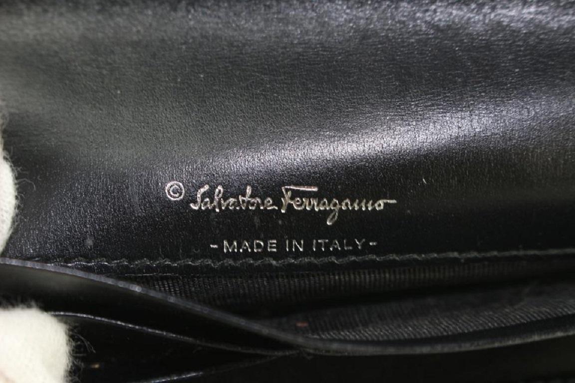 Salvatore Ferragamo Black Long Gancini Logo Embossed Long Flap 21mz1220 Wallet In Good Condition For Sale In Dix hills, NY