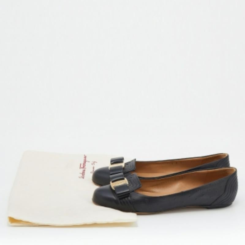 Salvatore Ferragamo brings to you these elegant ballet flats for your busy workdays! Crafted from ostrich embossed leather, the black flats flaunt bow details on the vamps and will match well with any outfit. The dainty pair is finished off with