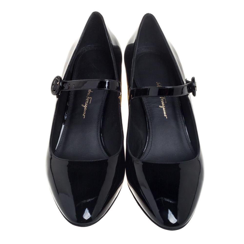 Made from patent leather, this pair of pumps will add a classic touch to your collection of heels. Designed in a Mary Jane style with almond toes, a buckle-fastening strap across the vamps, and 6 cm gold-tone heels, this black pair by Salvatore