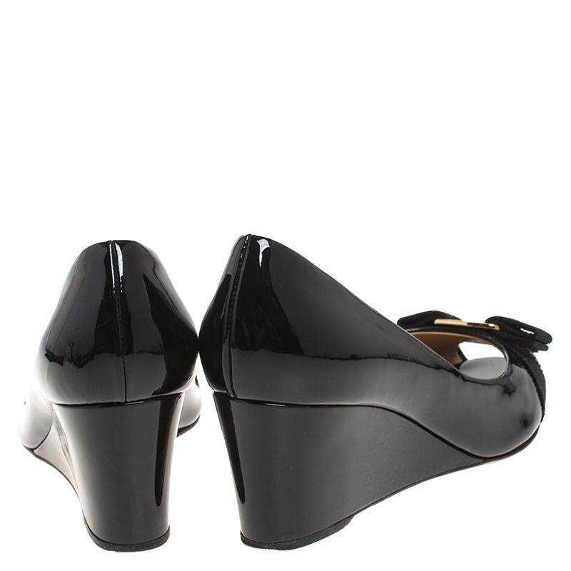 black patent leather wedge pumps