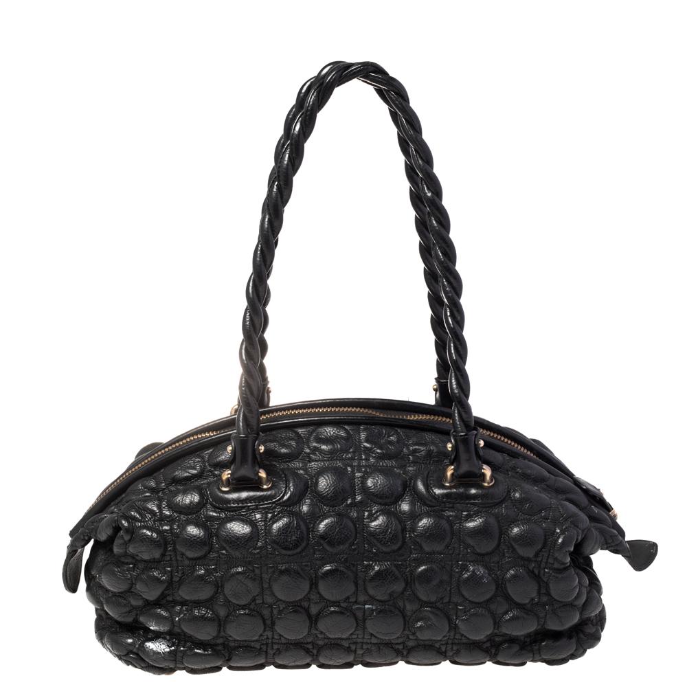 Made from quilted leather with a Gancini logo charm at the front, this bag can effortlessly be styled with both off-duty and formal looks. The insides are lined with nylon and are spaciously designed. Flaunt your high-end taste with this handbag