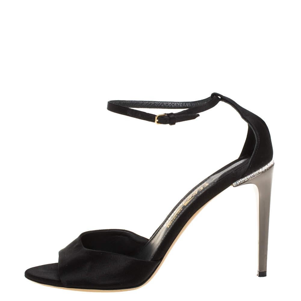 The right pair of shoes does not only make a woman look fabulous, but also gives her confidence. These Salvatore Ferragamo sandals, made from satin carry elegance and wonder in their design of open toes, ankle buckle fastenings, and 10 cm high