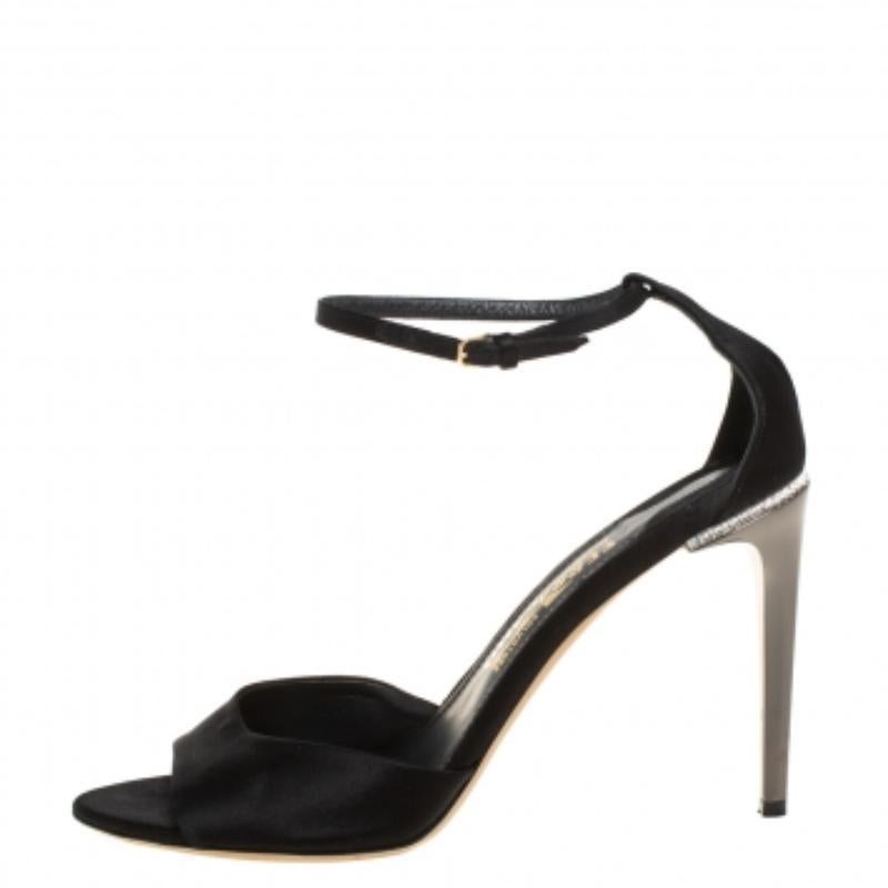 The right pair of shoes does not only make a woman look fabulous, but also gives her confidence. These Salvatore Ferragamo sandals, made from satin carry elegance and wonder in their design of open toes, ankle buckle fastenings, and 10 cm high