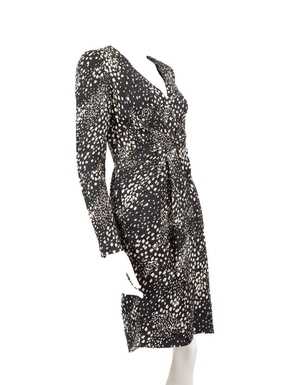 CONDITION is Very good. Hardly any visible wear to the dress is evident on this used Salvatore Ferragamo designer resale item.
 
 Details
 
 
 Black
 
 Silk
 
 Dress
 
 Knee Length
 
 Ruch detail
 
 Dotted patten
 
 2x Side pockets
 
 Padded