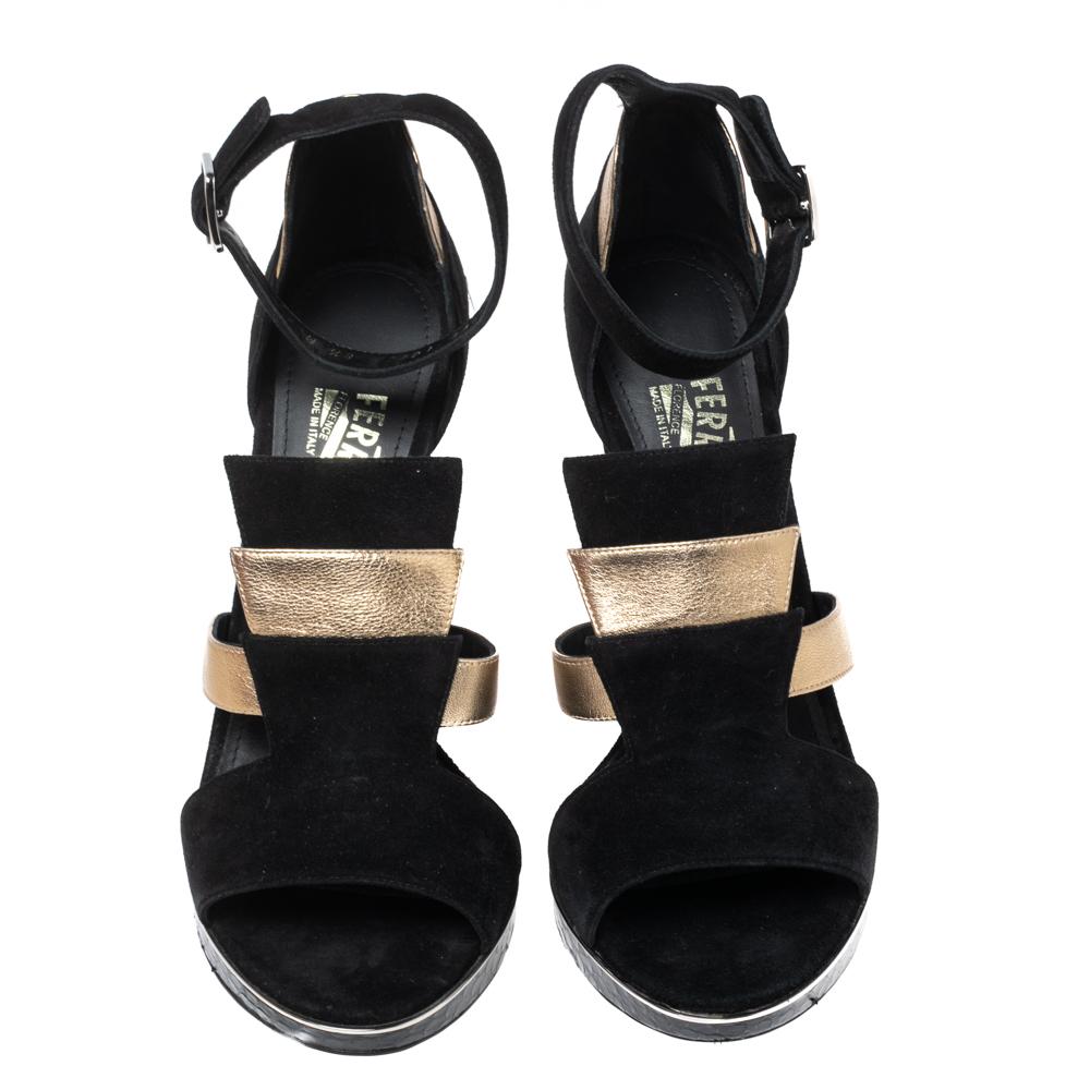 A perfect pair for parties and any evening occasion, these Salvatore Ferragamo Lexus platform sandals will stand out whenever you wear them. Fashioned using gold leather and black suede, they have open toes, ankle strap closure, and 13 cm