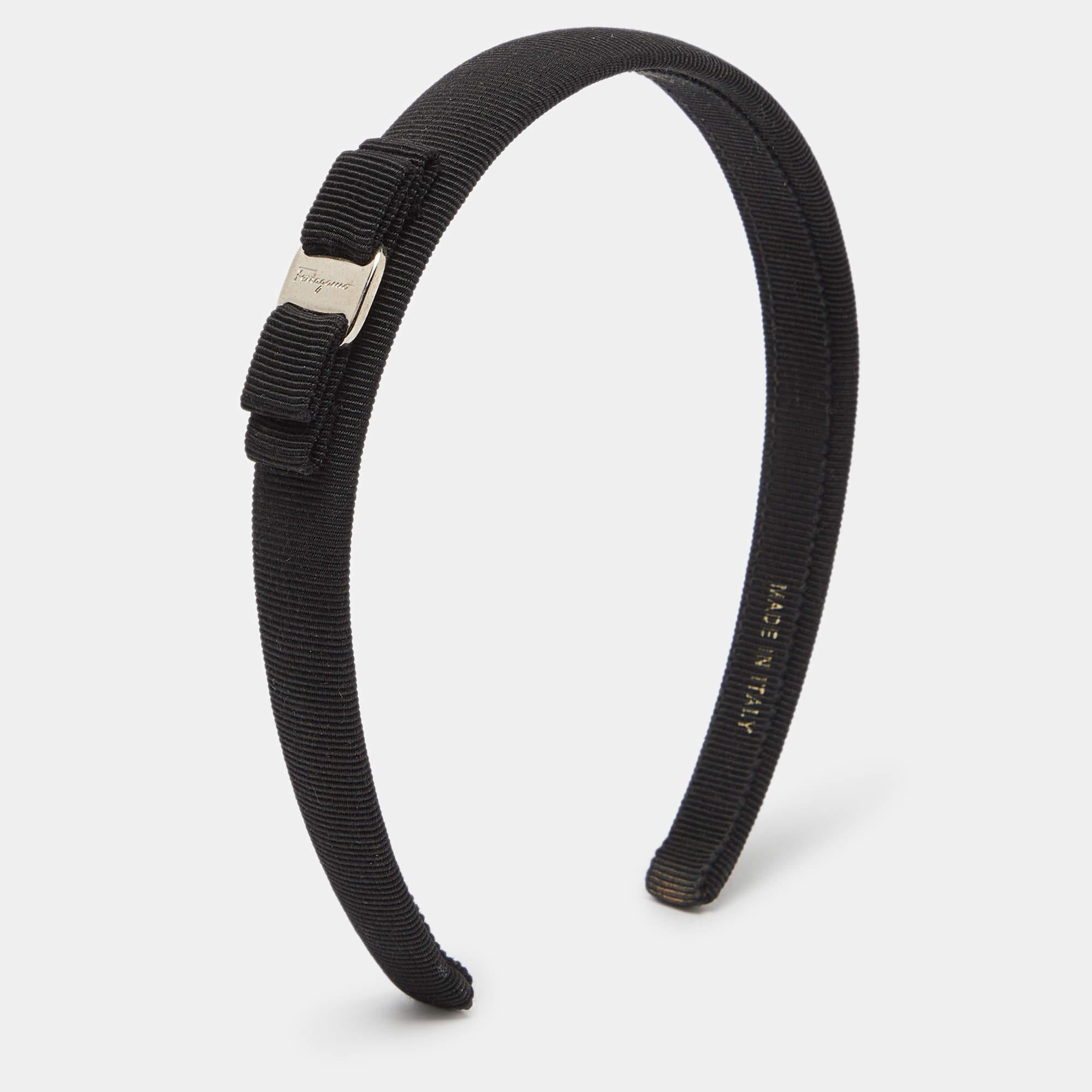 Salvatore Ferragamo offers this classic headband to give your accessory game a luxe upgrade. Made from black canvas the headband comes with a Vara bow and a comfortable fit.