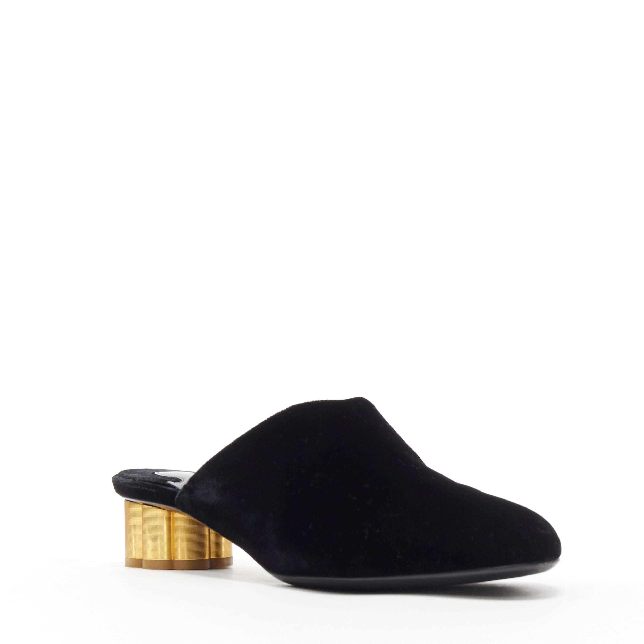 SALVATORE FERRAGAMO black velvet gold sculpted heel almond toe mule heel EU37
Brand: Salvatore Ferragamo
Model Name / Style: Velvet mule
Material: Velvet
Color: Black
Pattern: Solid
Extra Detail: Gold sculpted heel. Low (1-1.9 in) heel height.
