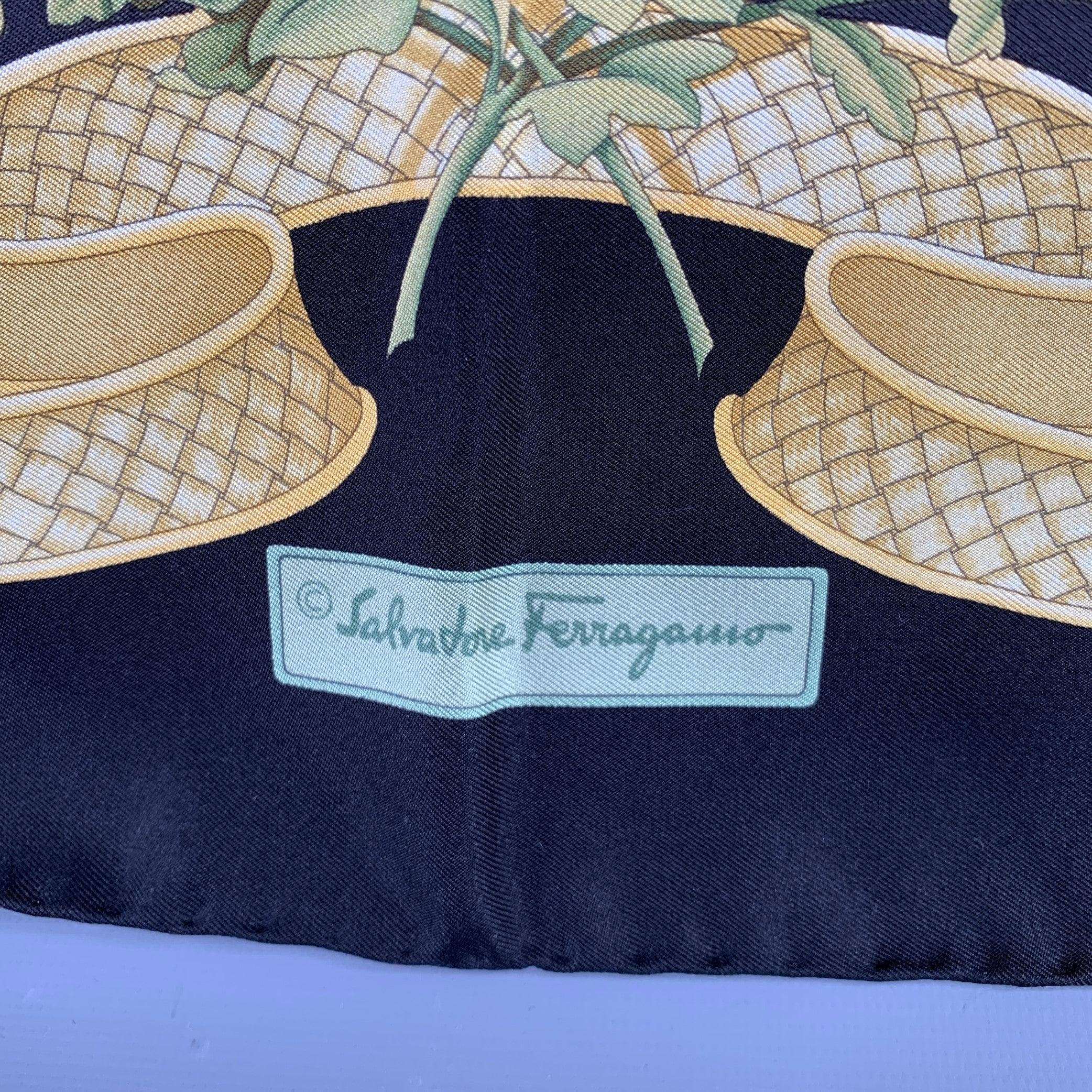 SALVATORE FERRAGAMO
scarf in a black silk featuring a yellow and green birds print, and picture frame border.Very Good Pre-Owned Condition. Minor mark on back. 

Measurements: 
  34 inches  x 34 inches 
  
  
 
Sui Generis Reference:
