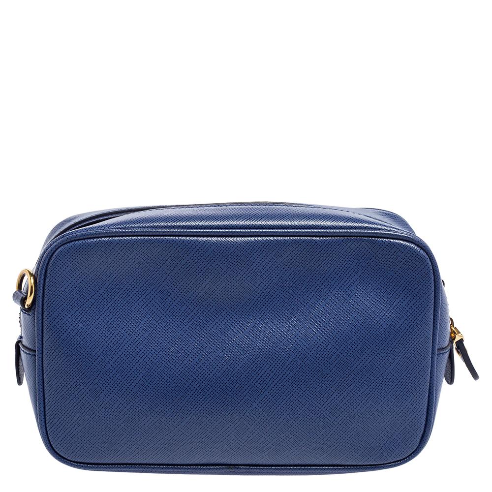 This shoulder bag from the House of Salvatore Ferragamo is an example of the label’s penchant for creating staple pieces. It is made from blue leather with a gold-toned Double Gancini motif perched on the front. Lastly, it is completed with a sturdy