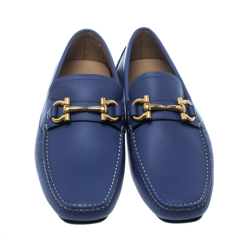 These blue loafers from Salvatore Ferragamo are not only high on appeal but also very skilfully made. They have been crafted from quality leather in Italy and designed with beauty using neat stitching and the Gancini logo on the uppers. The loafers
