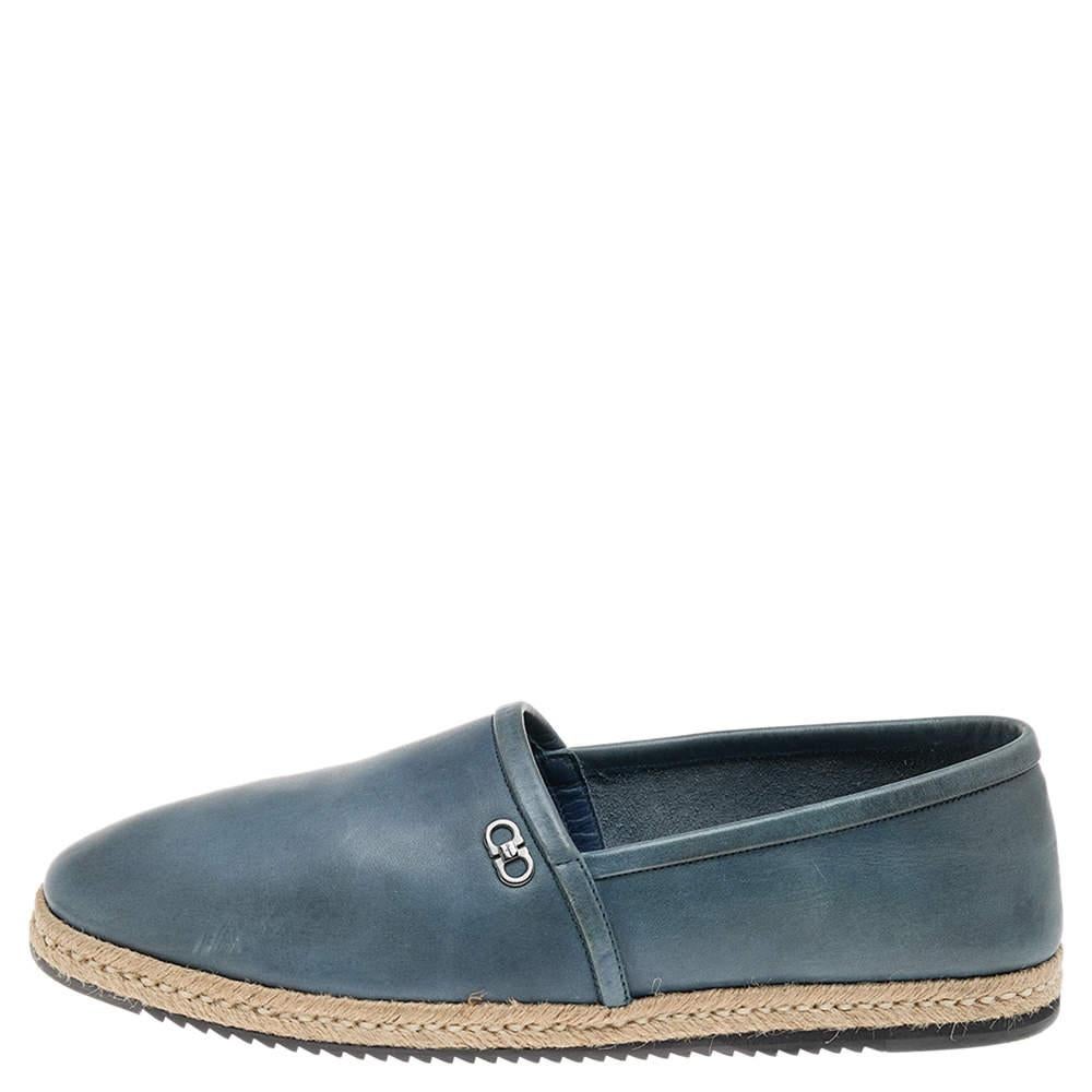 Bring Salvatore Ferragamo's aesthetic and class to your ensemble by wearing these stunning espadrilles. They are made from blue leather on the exterior and feature a logo detail on the upper. They come with covered toes and a slip-on style.