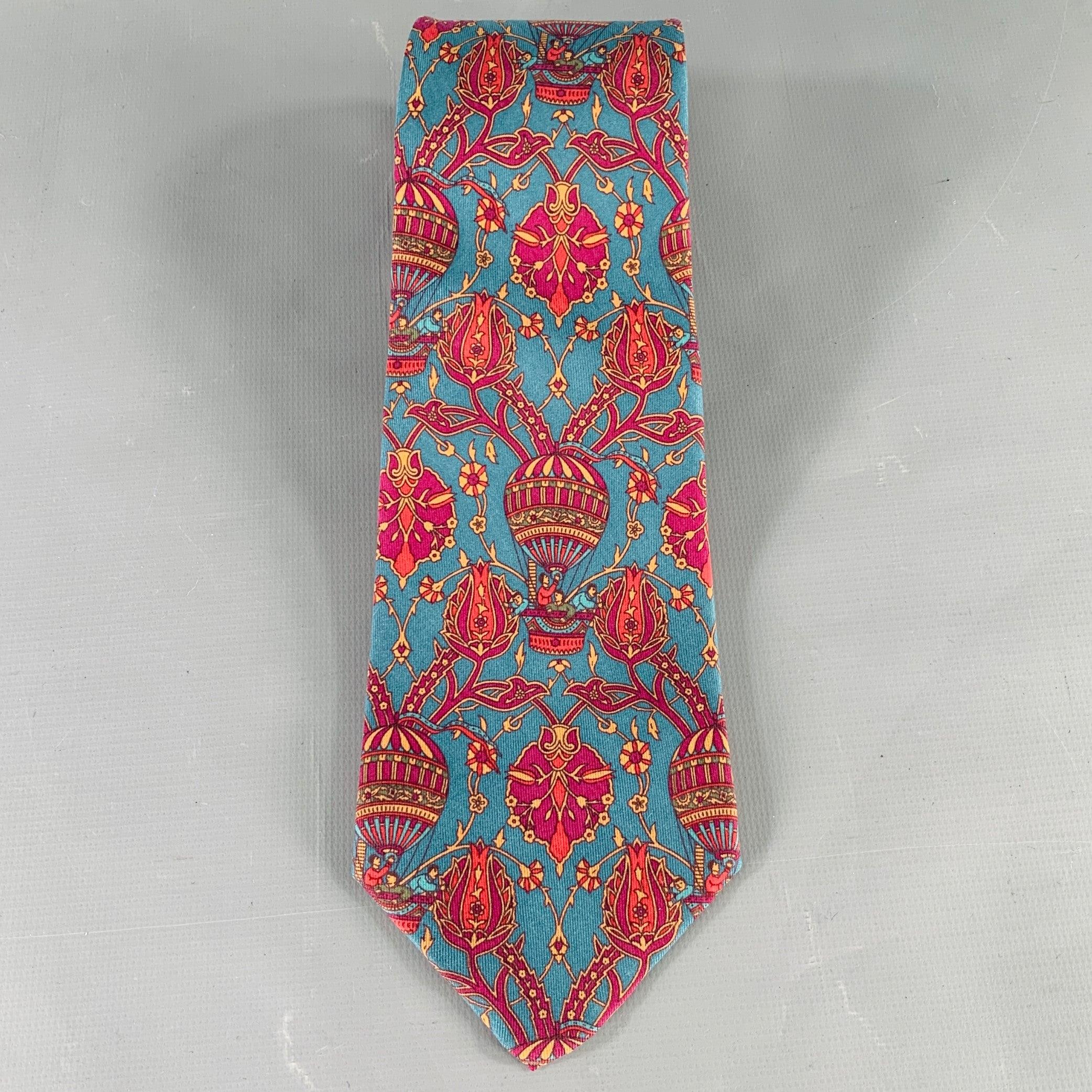 SALVATORE FERRAGAMO necktie
in a blue silk featuring a red hot air balloons pattern. Made in Italy.Very Good Pre-Owned Condition.Width: 3.25 inches Length: 56 inches 
  
  
 
Sui Generis Reference: 136880
Category: Tie
More Details
    
Brand: 
