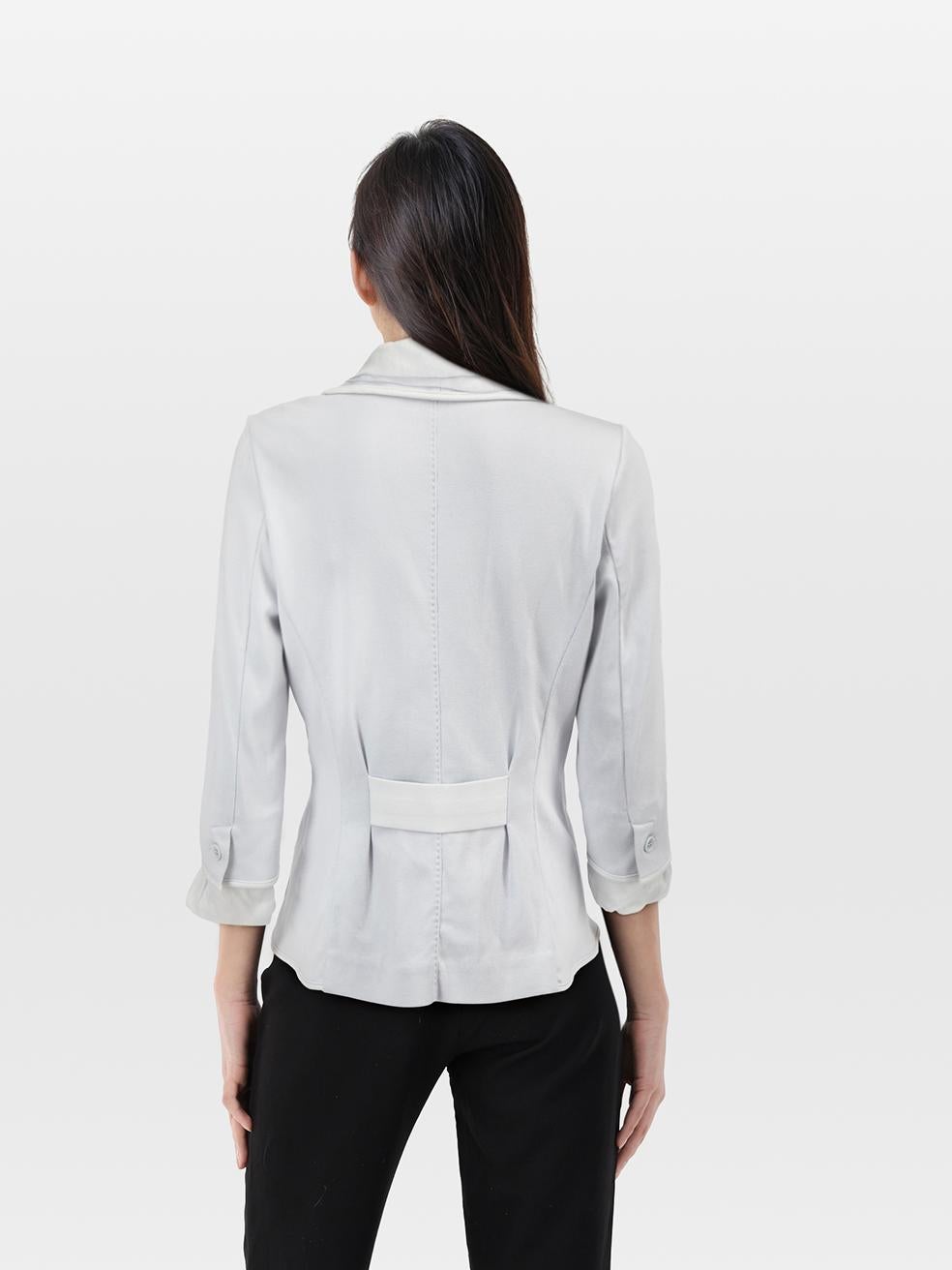 CONDITION is Verygood. Minimal wear to the jacket is evident. Marks on the front right lapel drape. Loose top stitching on the right side of this used Salvatore Ferragamo designer resale item. Marks may need gentle hand wash contrary to dry clean