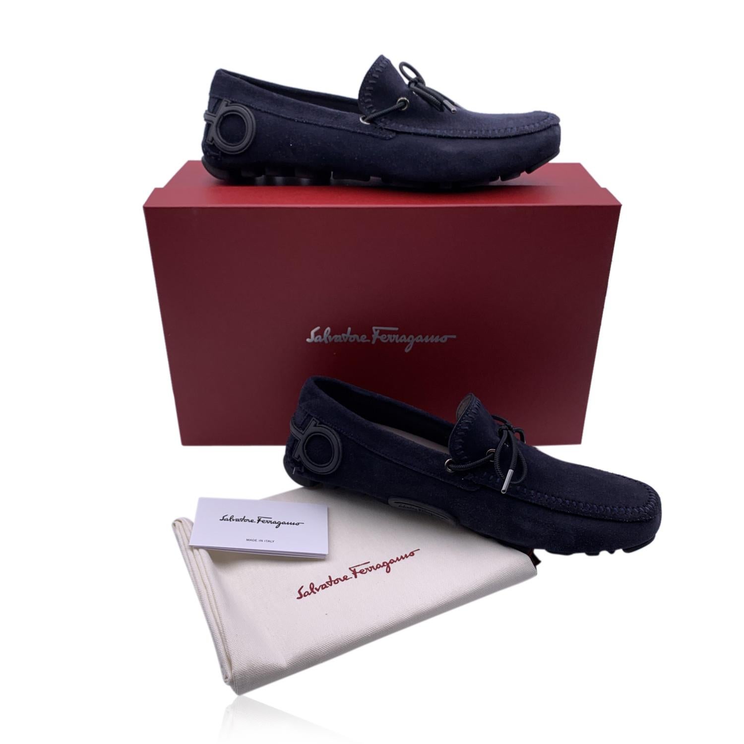 Beautiful Salvatore Ferragamo 'Atlante' Men Moccassins Loafers Shoes. Crafted in dark blue suede. They feature a square toe, drawstring detail on the toes and slip-on design. Rubber sole. Made in Italy. Size: US 7 EEE- EU 41 EEE (The size shown for