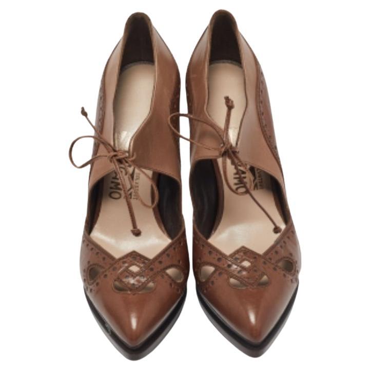 Salvatore Ferragamo Brown Brogue Leather Cut Out Lace Pumps Size 37.5