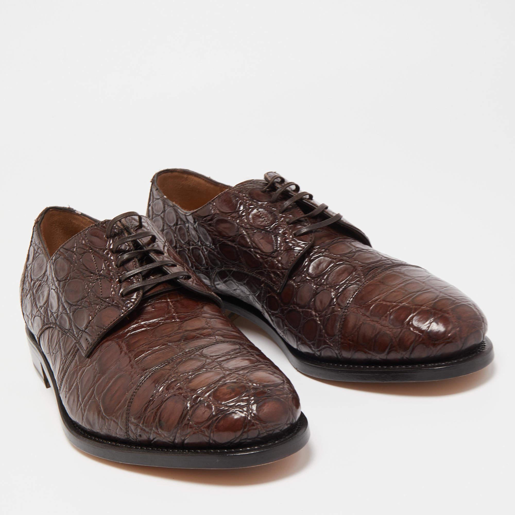 Let this comfortable pair be your first choice when you're out for a long day. These Salvatore Ferragamo derby shoes have well-sewn uppers beautifully set on durable soles.

