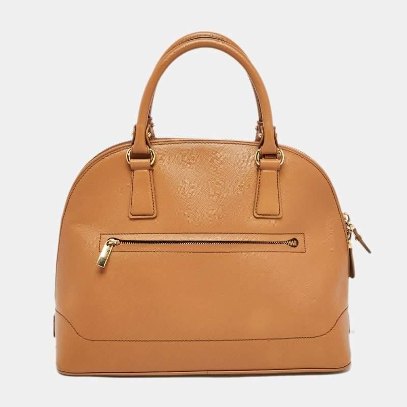This satchel is rendered in the finest quality materials into an elegant design. Versatile and functional, it is well-sized for your daily use.

Includes: Detachable Strap