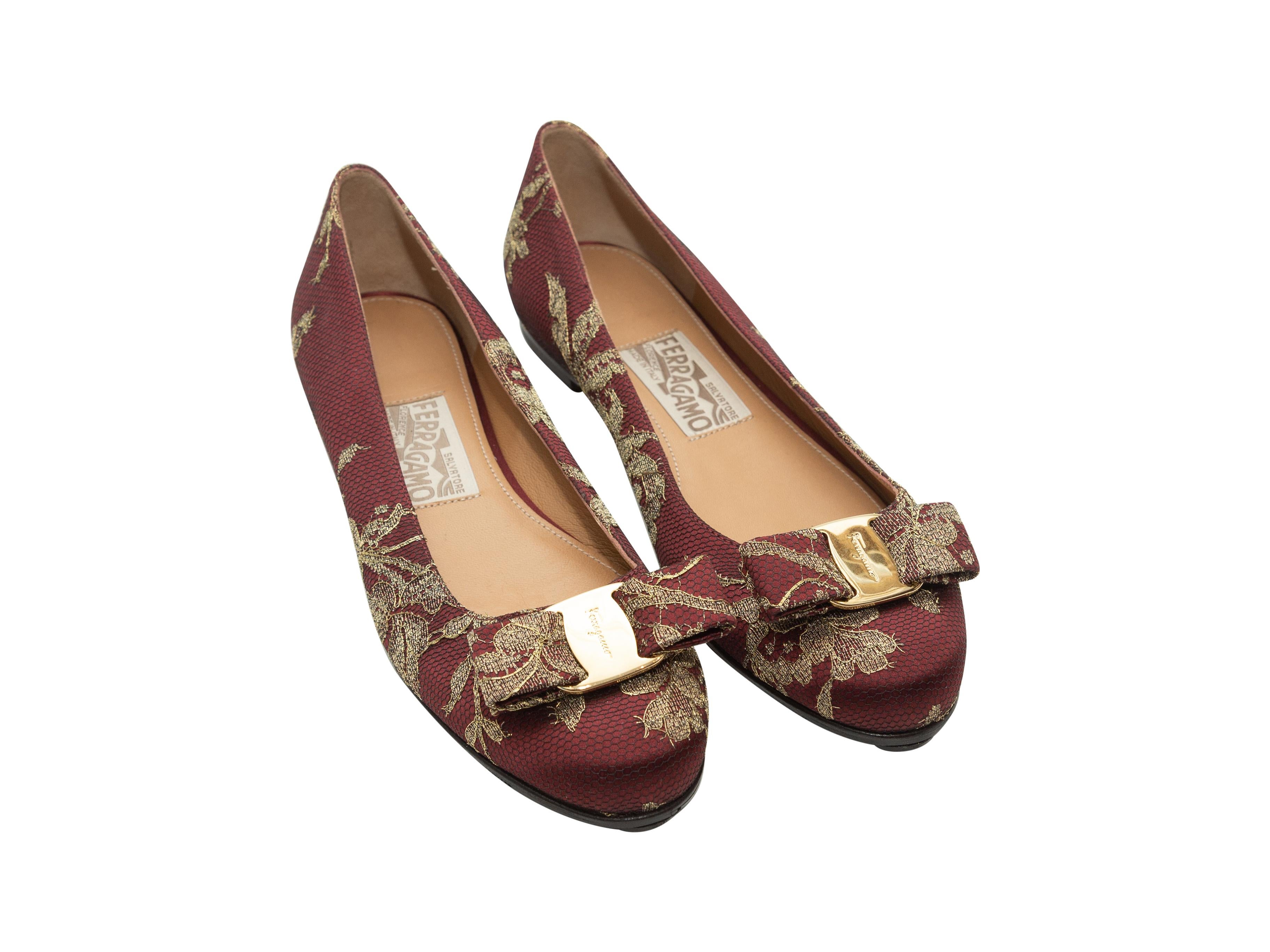 Product details: Vintage burgundy and gold satin and lace Varina ballet flats by Salvatore Ferragamo. Bow accents at tops. 
Condition: Pre-owned. Very good. Resoled.
Est. Retail $ 895.00