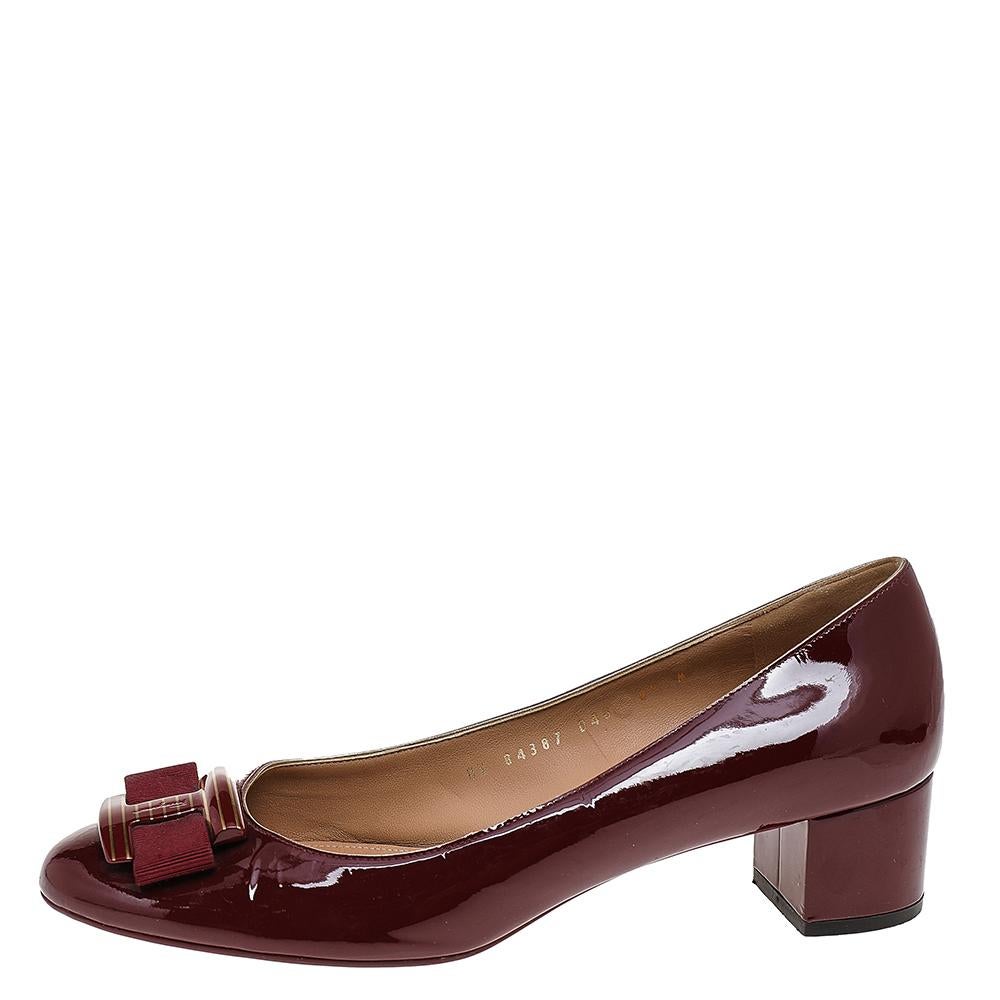 A stylish pair of shoes that are easy to wear and elegant enough for day parties, these Salvatore Ferragamo pumps are perfect to add a pop of color to your look. Crafted in burgundy leather, these pumps feature the Vara bow detail on the vamps along