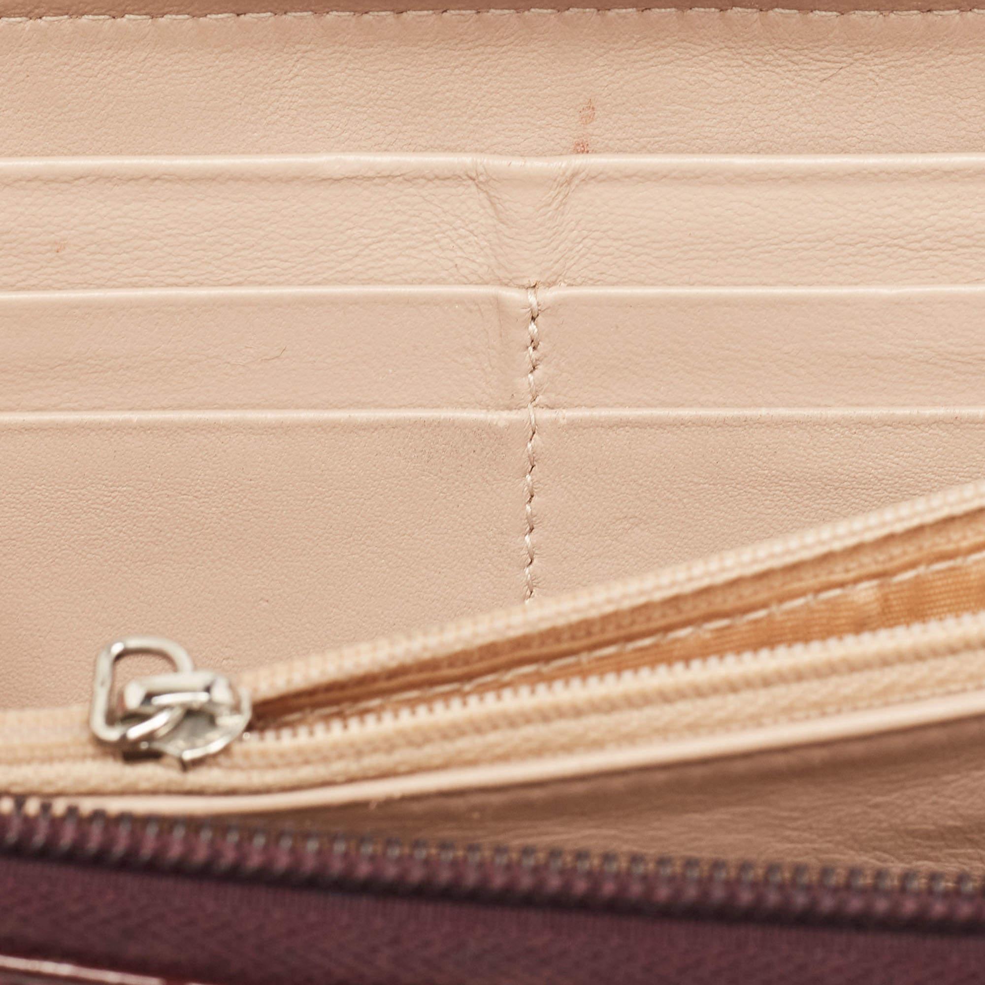 Brown Salvatore Ferragamo Burgundy Patent Leather Vara Bow Zip Around Wallet For Sale