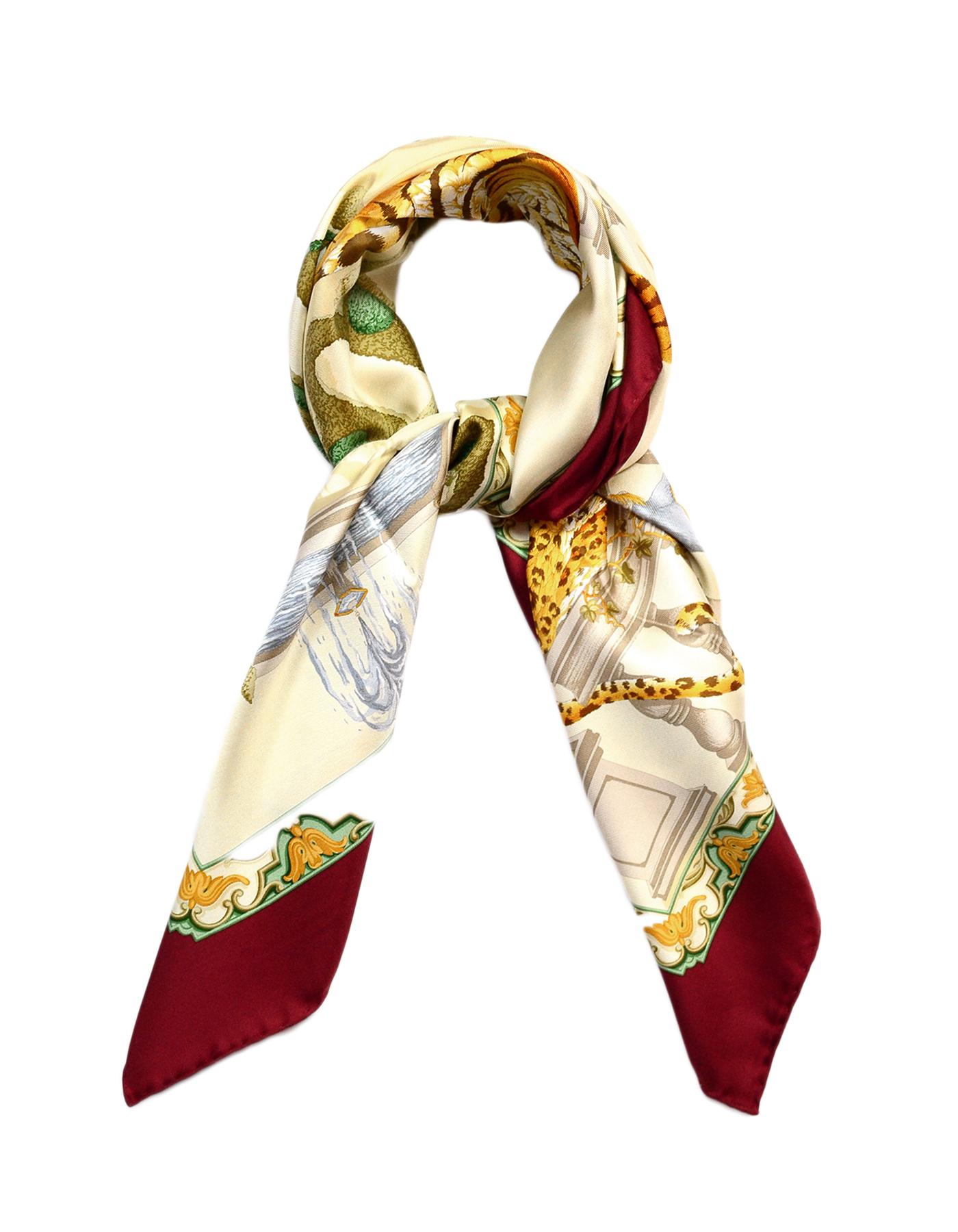 Salvatore Ferragamo Burgundy Red/Cream Leopard Silk Scarf 90cm

Made In: Italy  
Color: Burgundy red, cream
Materials: 100% silk
Overall Condition: Excellent pre-owned condition 
Includes:  Salvatore Ferragamo sleeve box

Measurements: 
35