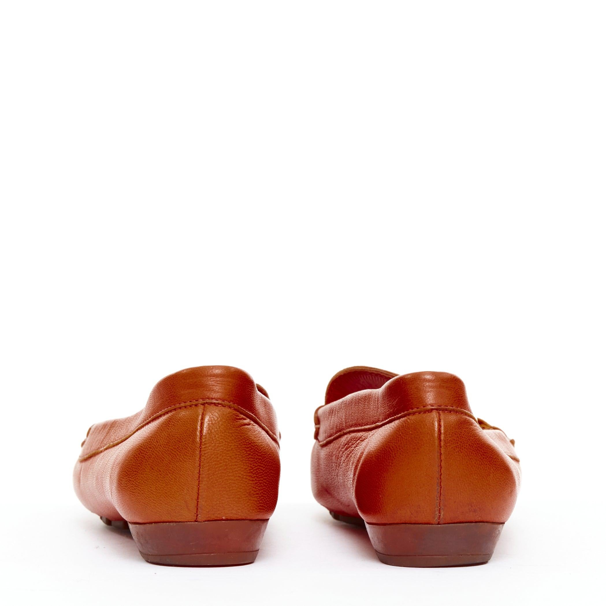 Donna Salvatore Ferragamo mocassini in pelle arancione bruciato con fibbia dorata 6.5 in vendita