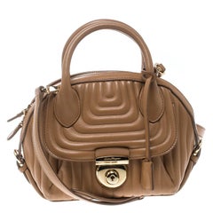 Salvatore Ferragamo Sac à main en cuir matelassé Mini Fiamma Camel