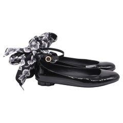 Salvatore Ferragamo Cefalu Flats in Black Patent Leather