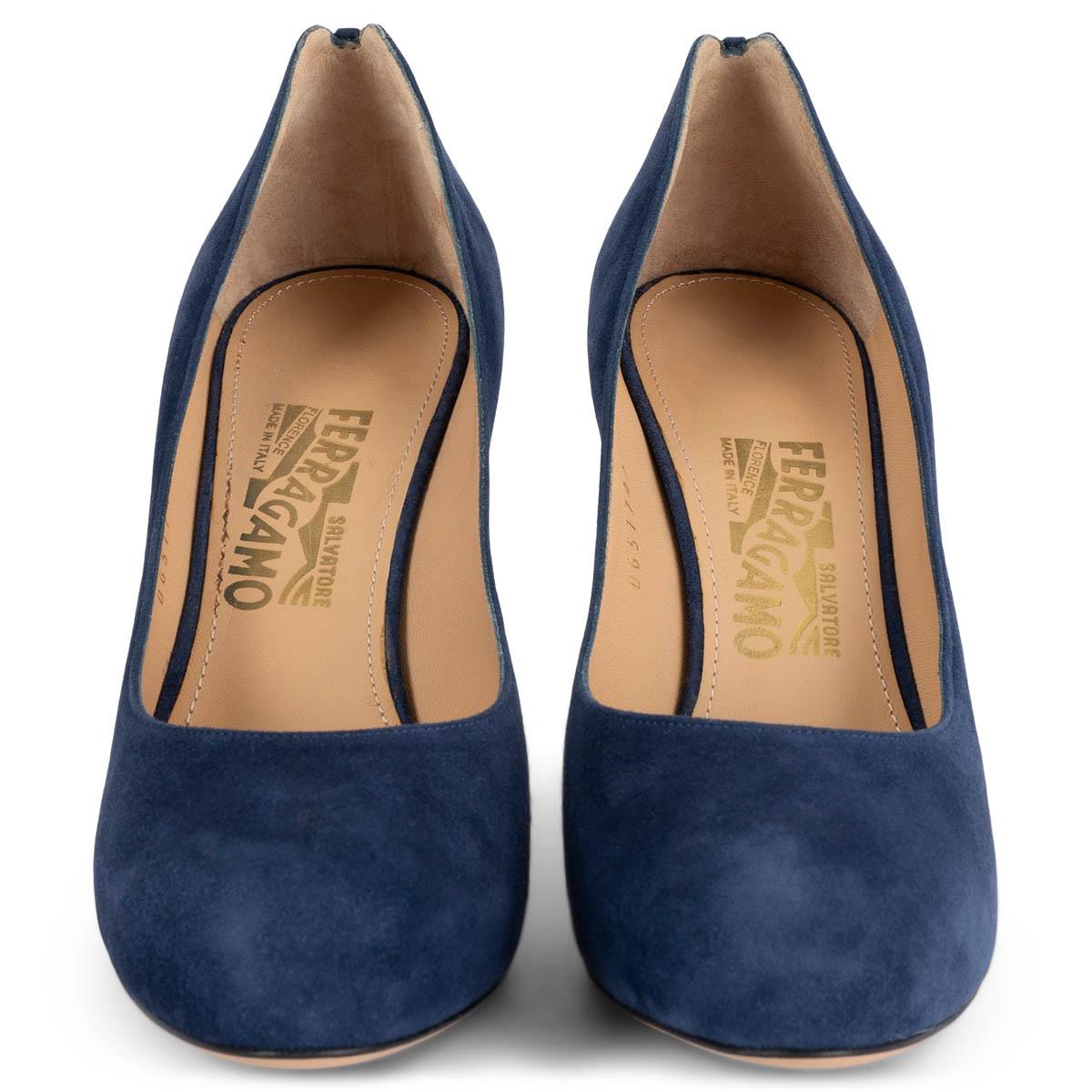 100% authentic Salvatore Ferragamo hidden platform pumps in navy blue suede with a patent leather heel. Have been worn once inside and are in virtually new condition. 

Measurements
Imprinted Size	7.5
Shoe Size	37.5
Inside Sole	24.5cm