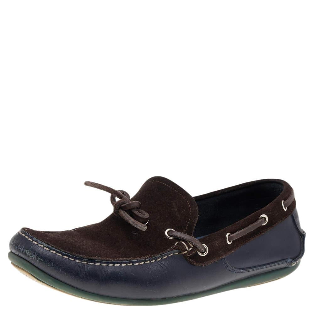 Right on style and comfort, this pair of loafers by Salvatore Ferragamo will make a great addition to your shoe collection. They have been crafted from suede and leather and they feature bow ties on the upper. Leather insoles and tough outsoles make