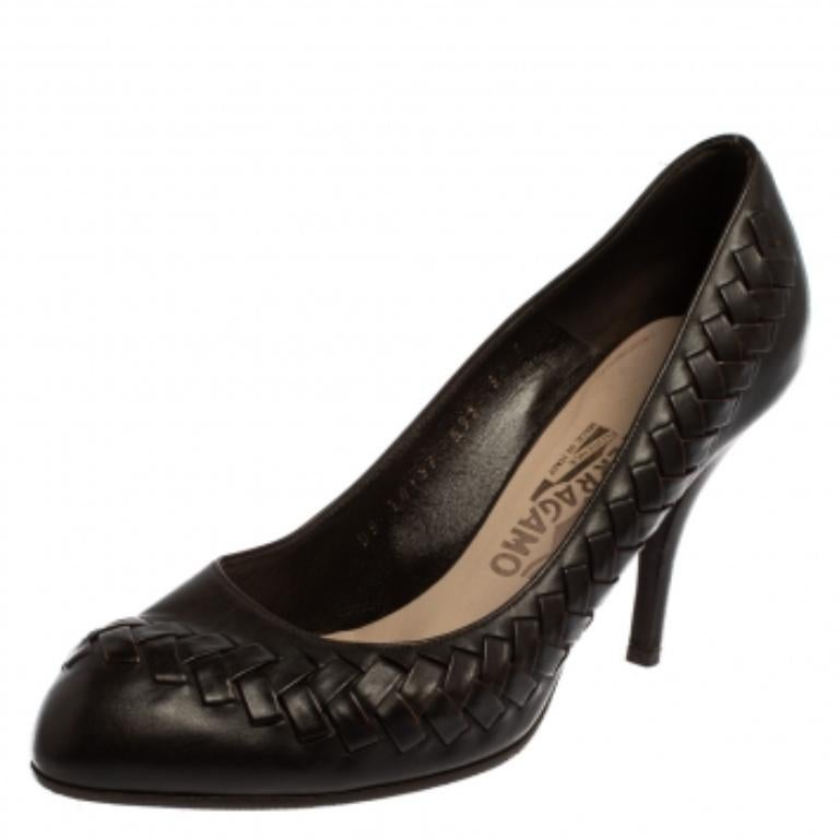This amazing pair of pumps from Salvatore Ferragamo is sure to add some class to your outfits. The almond toe pumps have been crafted from dark brown leather and they come with woven stitch details and comfortable insoles. They are elevated on 9 cm
