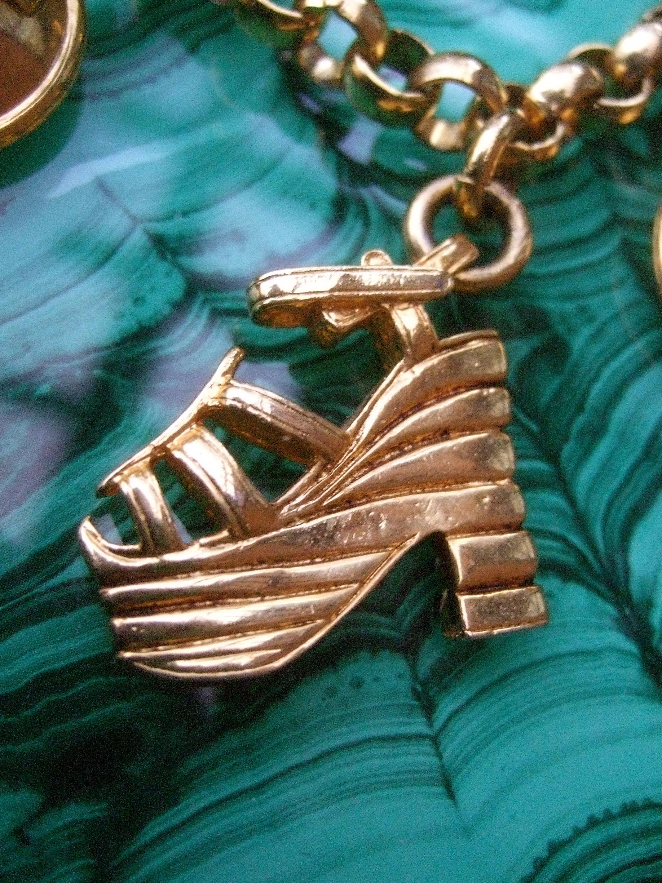 Modern Salvatore Ferragamo Gilt Metal Shoe Themed Charm Bracelet c 1990s For Sale