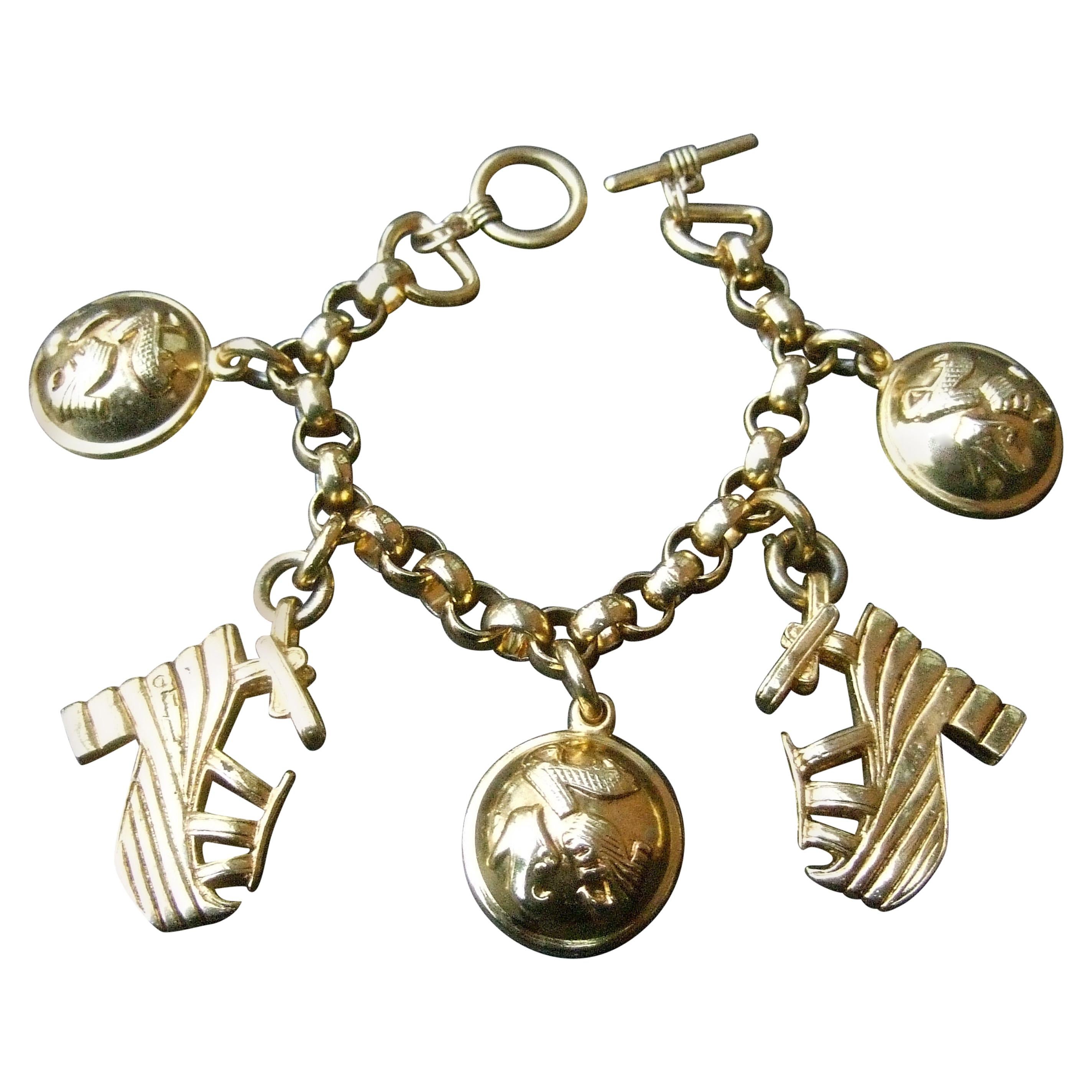 Salvatore Ferragamo Gilt Metal Shoe Themed Charm Bracelet c 1990s For Sale