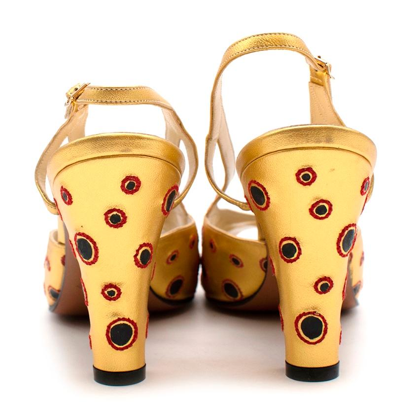 Salvatore Ferragamo Gold Leather Dotted Limited Edition of 500, 1930's Sling Backs

Limited numbered re-edition of the Salvatore Ferragamo archives. This style was designed in 1930 and this pair is numbered the 32/500.

- Made of soft leather 
-