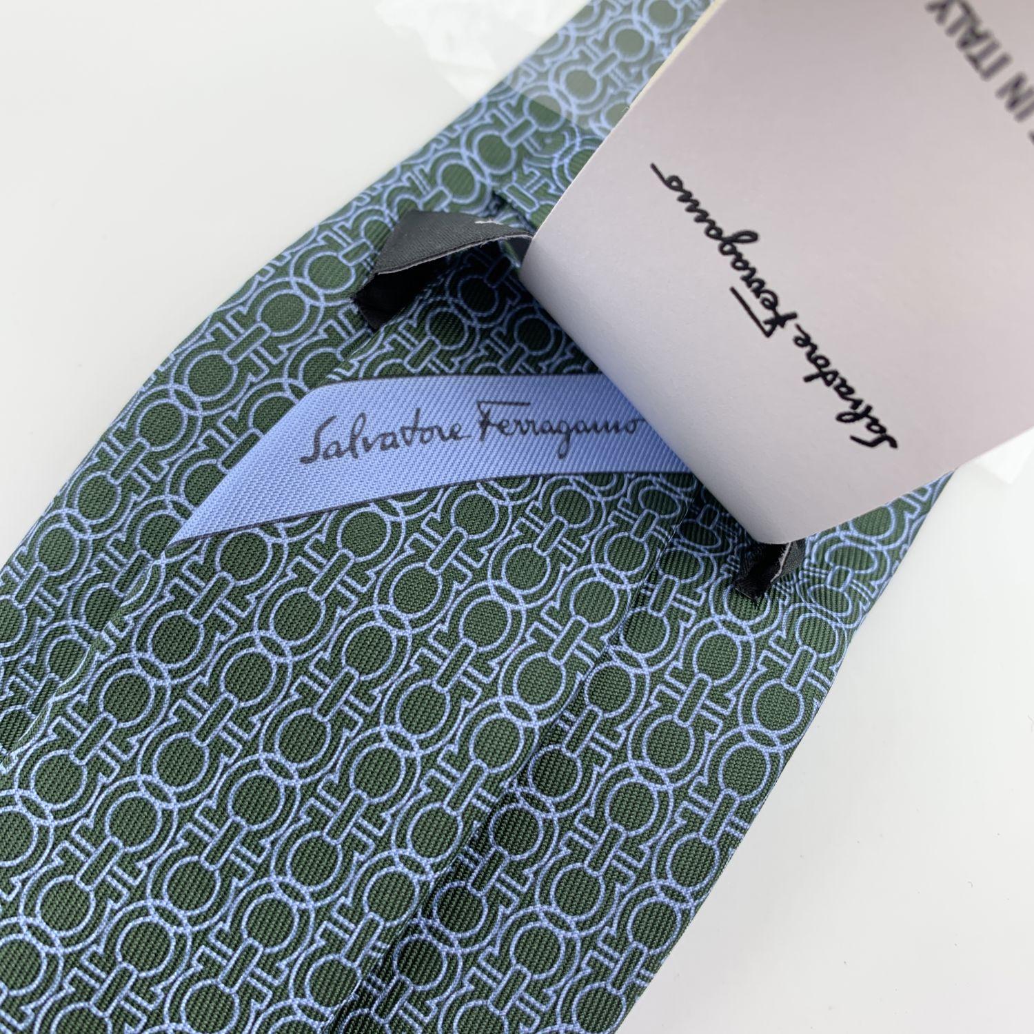 Salvatore Ferragamo 'Icona' men neck tie. Allover light blue Gancini pattern on dark green background. Composition: 100% Silk. Measurements: 60 x 3.1 inches - 152 x 8 cm. Made in Italy.

Retail price was 155 Euros


Details

MATERIAL: Silk

COLOR: