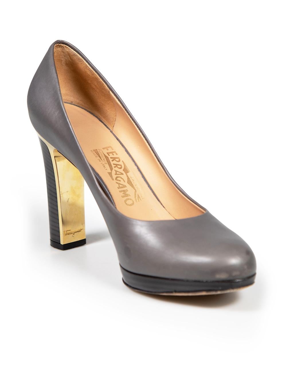 CONDITION is Very good. Minimal wear to pumps is evident. Minimal abrasions to the tip and back of both shoes. Small scratches on the front, sides, back and heels of both shoes on this used Salvatore Ferragamo designer resale item. This item comes