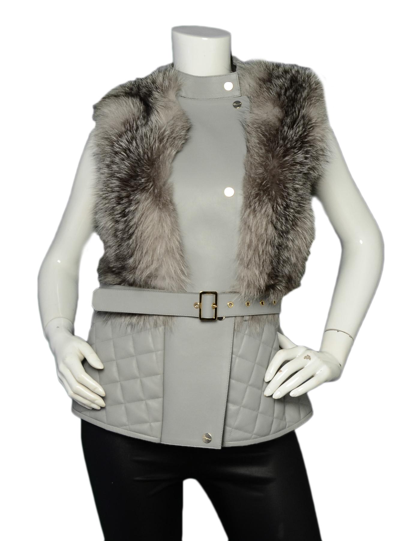 Salvatore Ferragamo Grey Leather Quilted Vest w/ Belt & Fur Detail sz 42

Made In: Italy
Color: Grey 
Materials: Leather, fur (missing composition tag)
Lining: Missing composition tag
Opening/Closure: Front zip closure with snaps
Overall Condition: