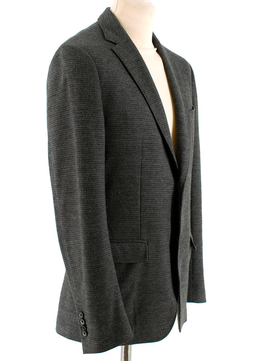 Salvatore Ferragamo Grey Wool Knit Single Breasted Blazer

- Notched lapel
- Two front pockets
- Single breasted
- Fully lined
- Padded shoulders

Materials:
Outer
100% Virgin Wool
Lining 
100% Cupro

Made in Italy

Measurements are taken laying