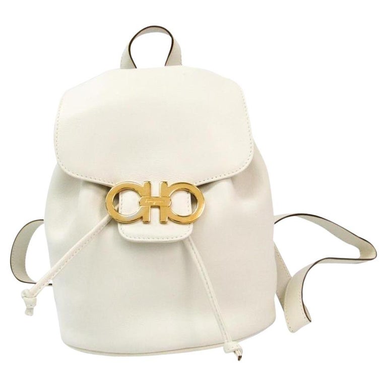 Salvatore Ferragamo Ivory Leather Gold Gancini Logo Mini Backpack 860724 at  1stDibs | ferragamo mini backpack, gold mini backpack