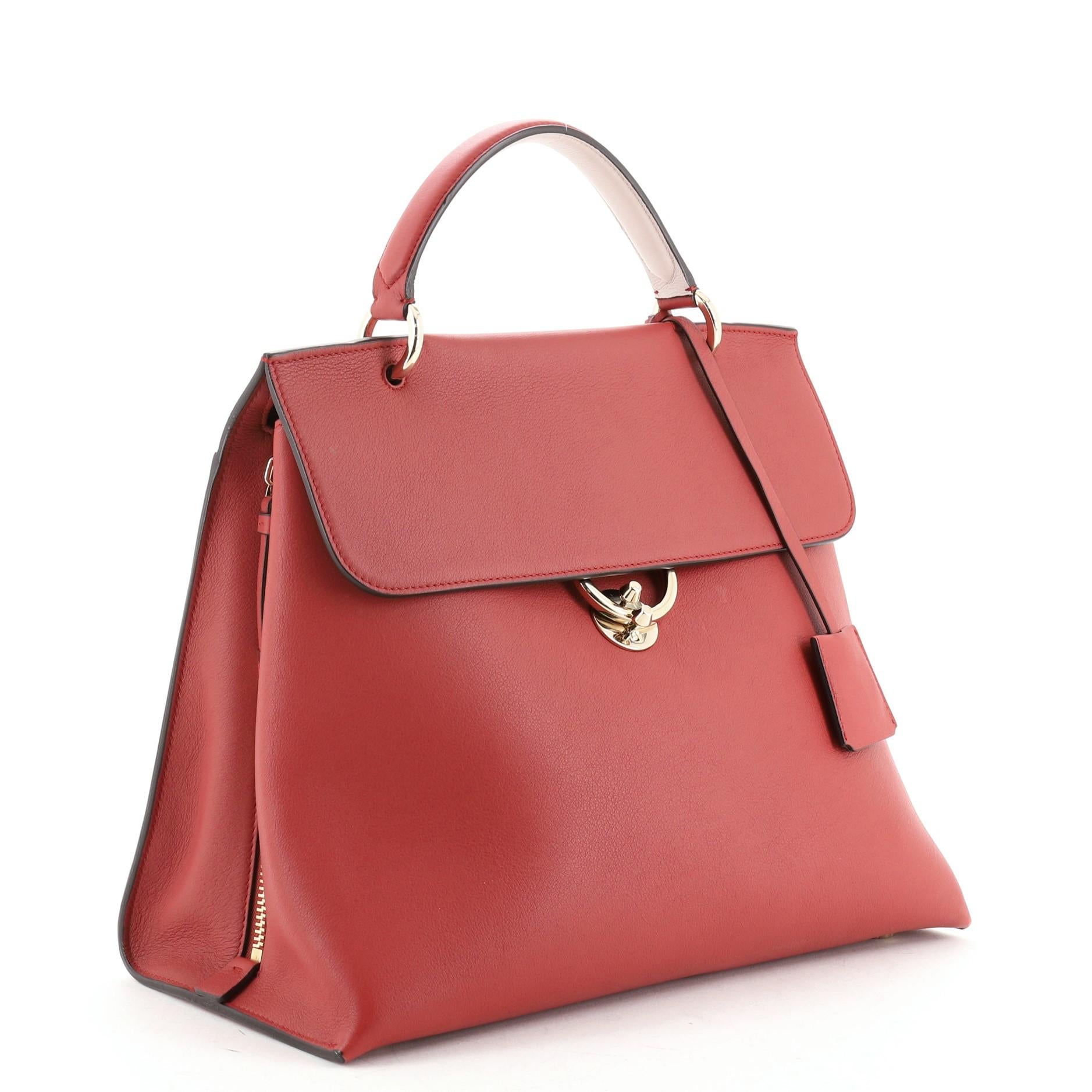 Salvatore Ferragamo Jet Set Top Handle Bag Leather Large
Red

Condition Details: Creasing, minor marks and indentations on exterior. Wear on base corners, scuffs underneath flap, scratches on hardware.

52282MSC

Height 11