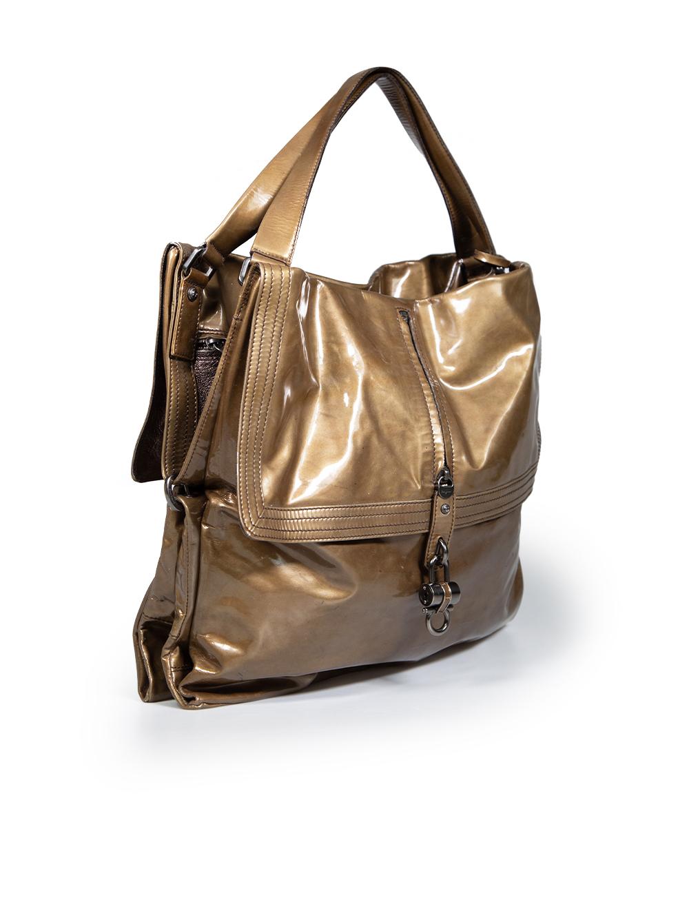 CONDITION is Good. General wear to bag is evident. Moderate signs of discolouration to the front and back. Minimal abrasion and peeling on the rear right panel and near the zip of internal bag. Minor scratches and indent to the rear handle on this