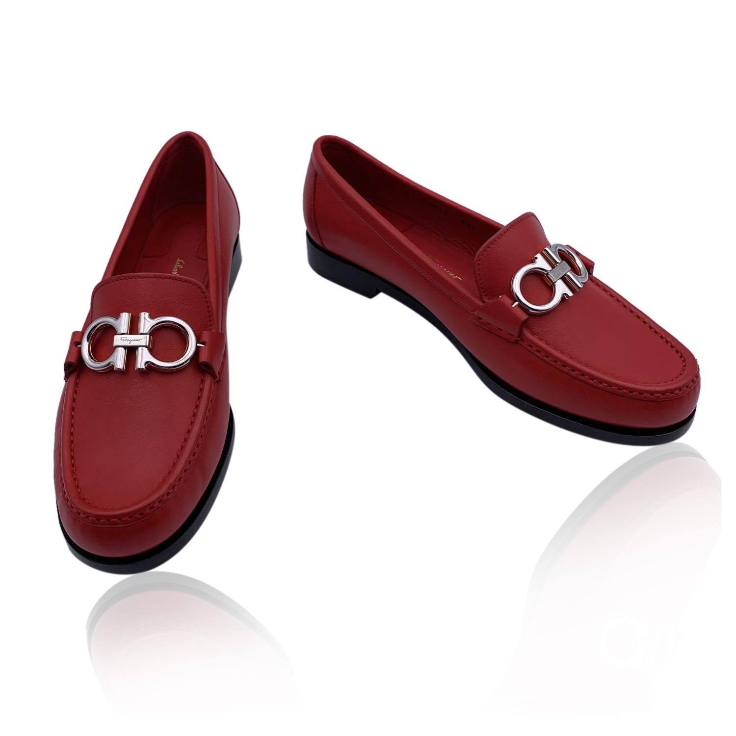Beautiful Salvatore Ferragamo 'Rolo' Moccassins Loafers Shoes. Crafted in red calf leather. They feature a round toe, silver metal Gancini detailing on the toes and slip-on design. Leather sole. Padded insole. Heels height: 1cm. Made in Italy. Size: