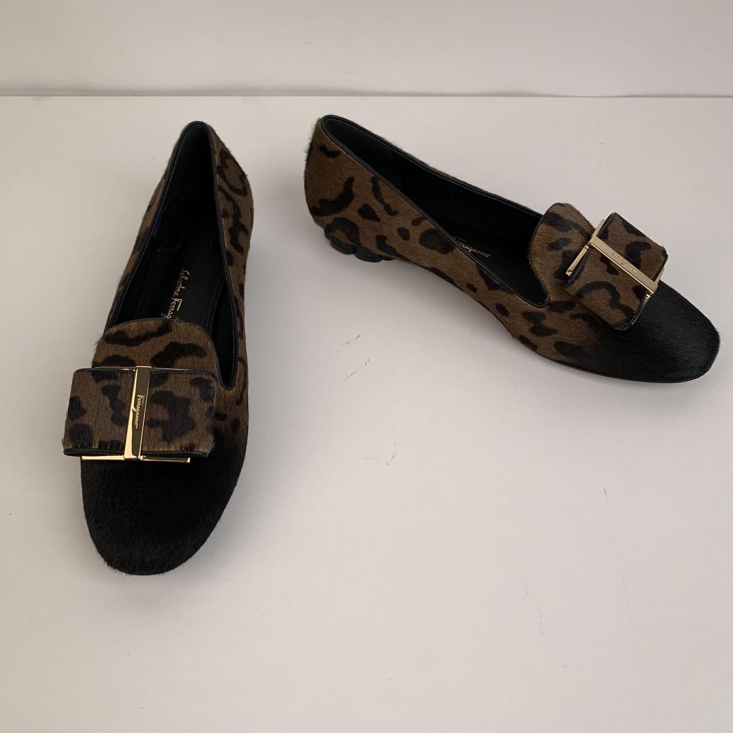 Beautiful Salvatore Ferragamo Leopard ballet flat. Crafted in leopard pony hair upper, they feature a round toe, slip-one design, Vara-bow detailing with gold metal accents on the toes and block flower-shaped heel (height: 1cm). Leather sole. Made