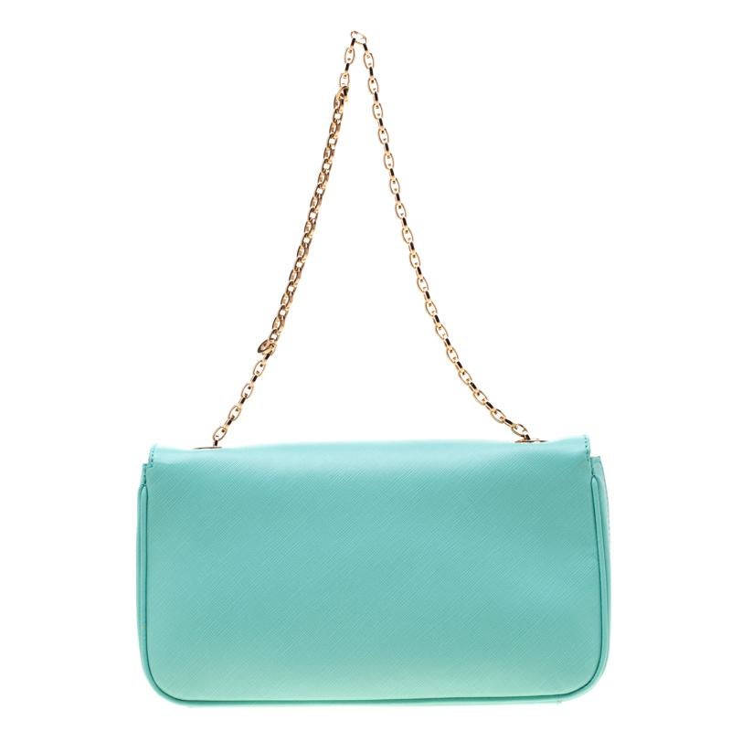 This mint green flap bag from the house of Salvatore Ferragamo is lovely. It is crafted from leather and designed with a shoulder chain and the Gancini logo on the flap. This piece will do justice to your style in an easy way.

Includes: Original