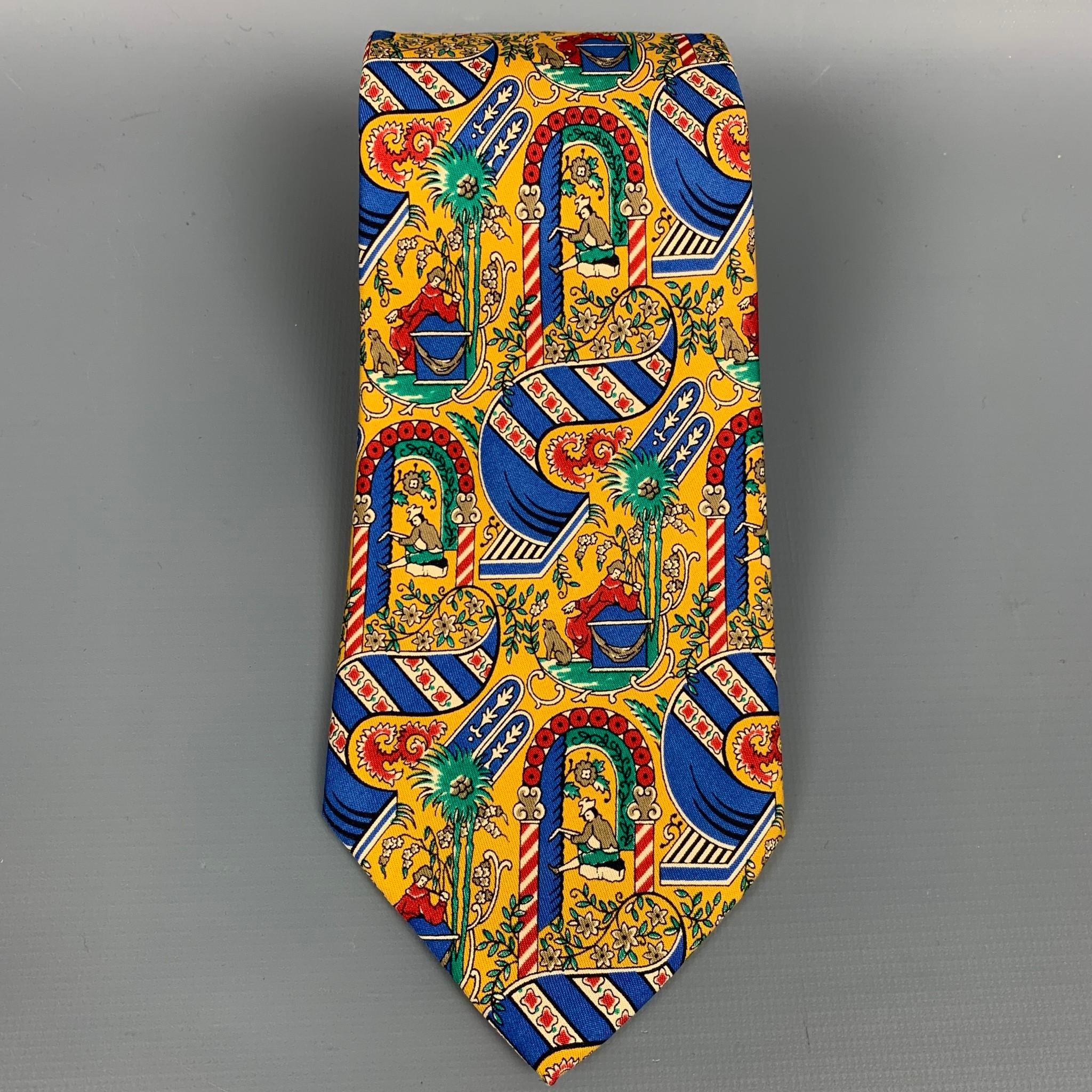 SALVATORE FERRAGAMO neck tie comes in a multi-color print silk. Made in Italy.

Very Good Pre-Owned Condition.

Measurements:

Width: 3.5 in.  