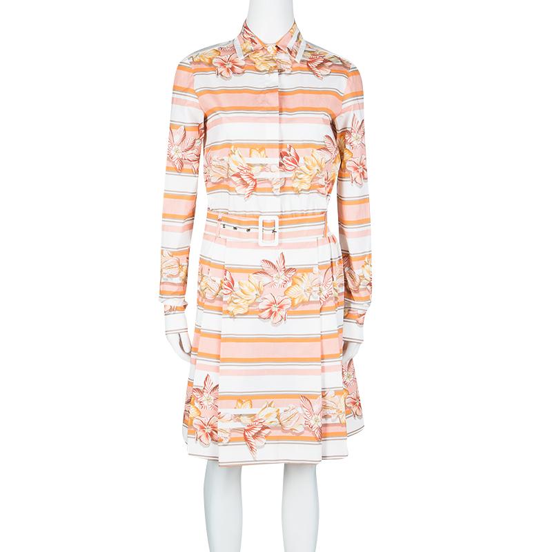 Step out in style this season with this lovely shirt dress from Salvatore Ferragamo. Tailored from cotton, this printed dress has long sleeves, a skirt with pleats and a belt detail which gives it a great shape. You can team this dress with sandals
