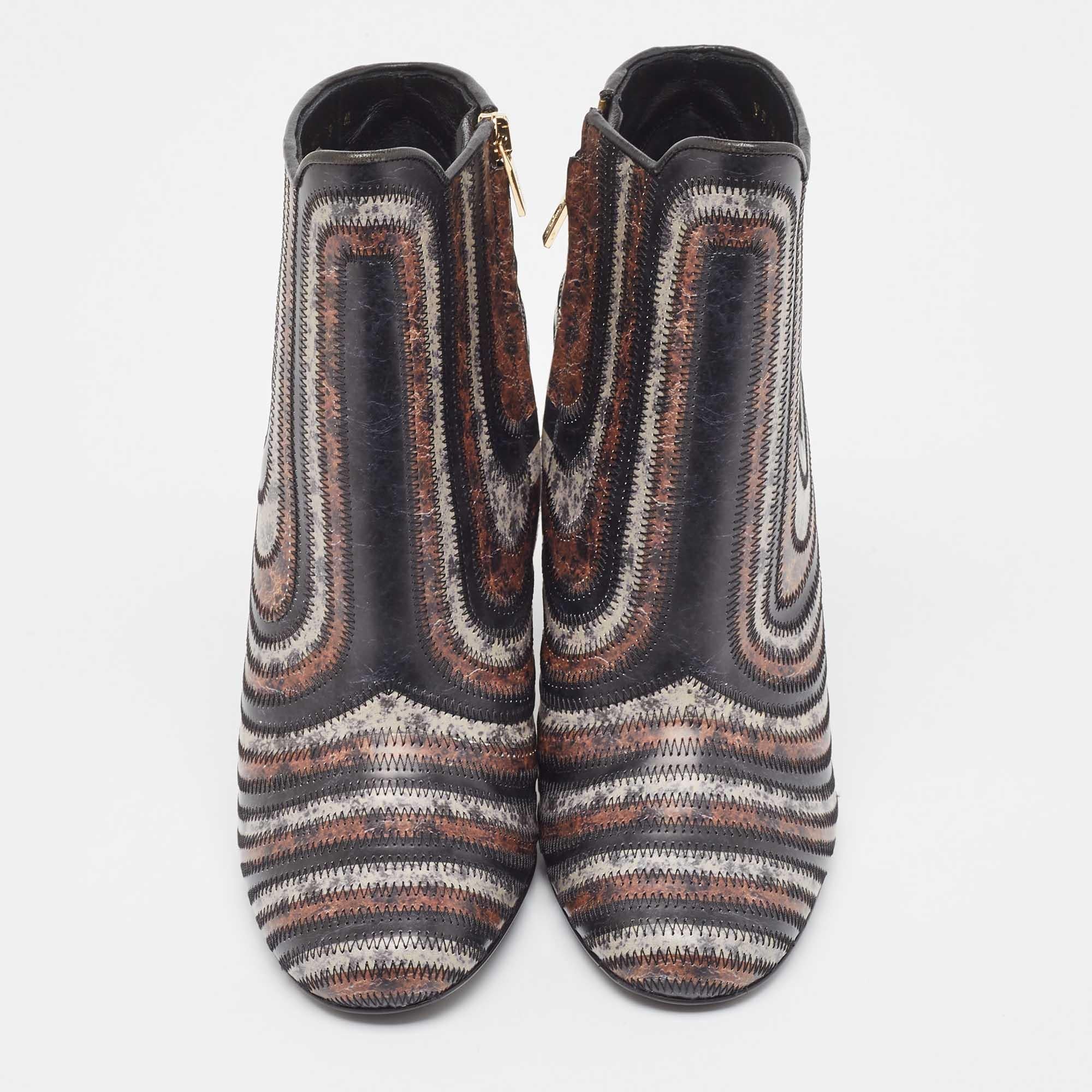 Elevate your style with these Salvatore Ferragamo boots for women. Crafted with precision, these chic and versatile boots blend fashion and comfort, offering sophistication for every season.

Includes
Original Box, Info Booklet